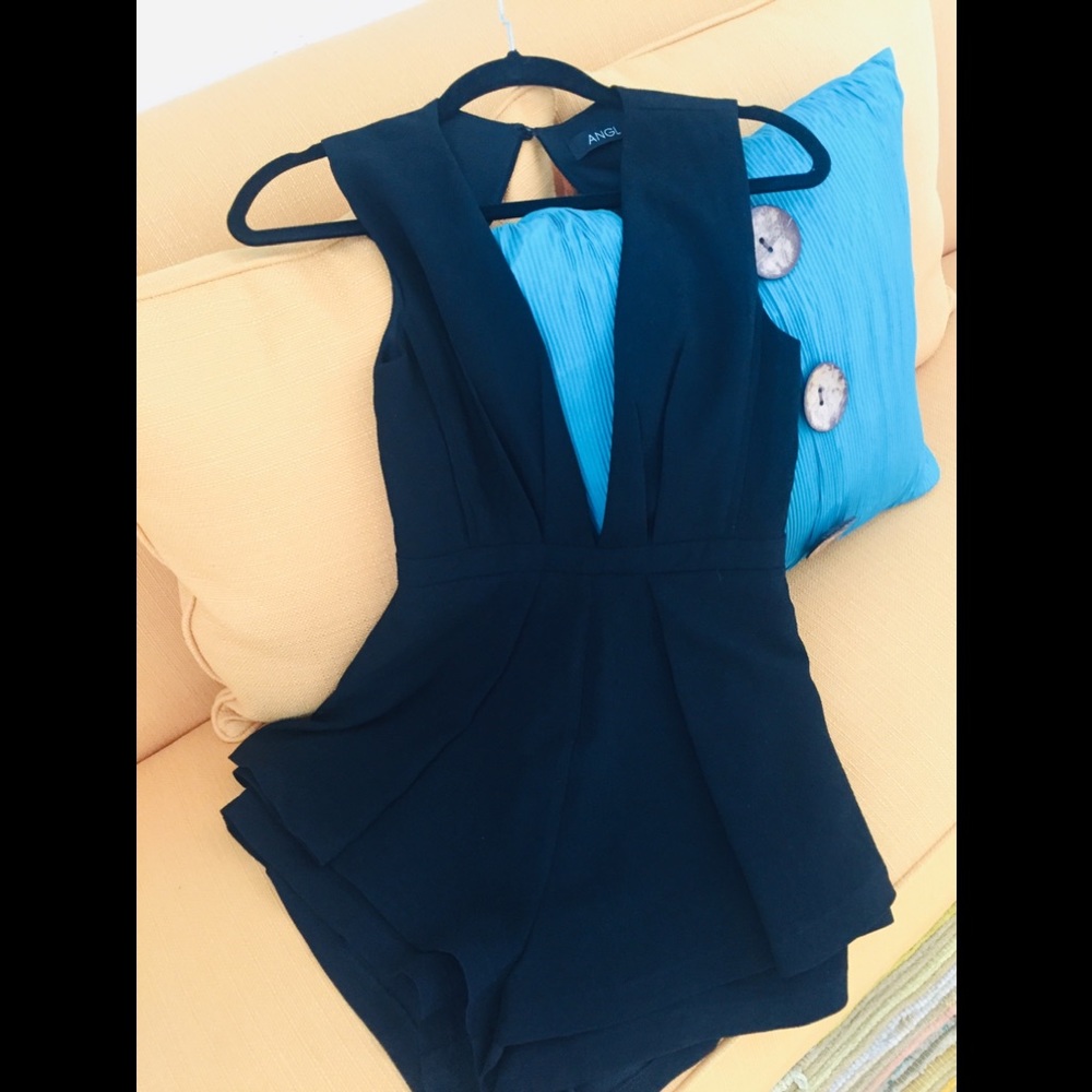Angl black backless with low cut neck line romper